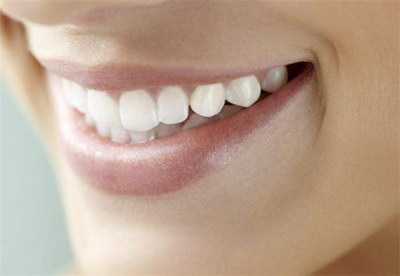 牙齿松动是什么原因怎样治疗_牙齿为什么会松动怎么治